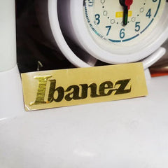 Ibanez Guitar Head Logo Tearable Film Pressure Sticker - Gold Metal Logo