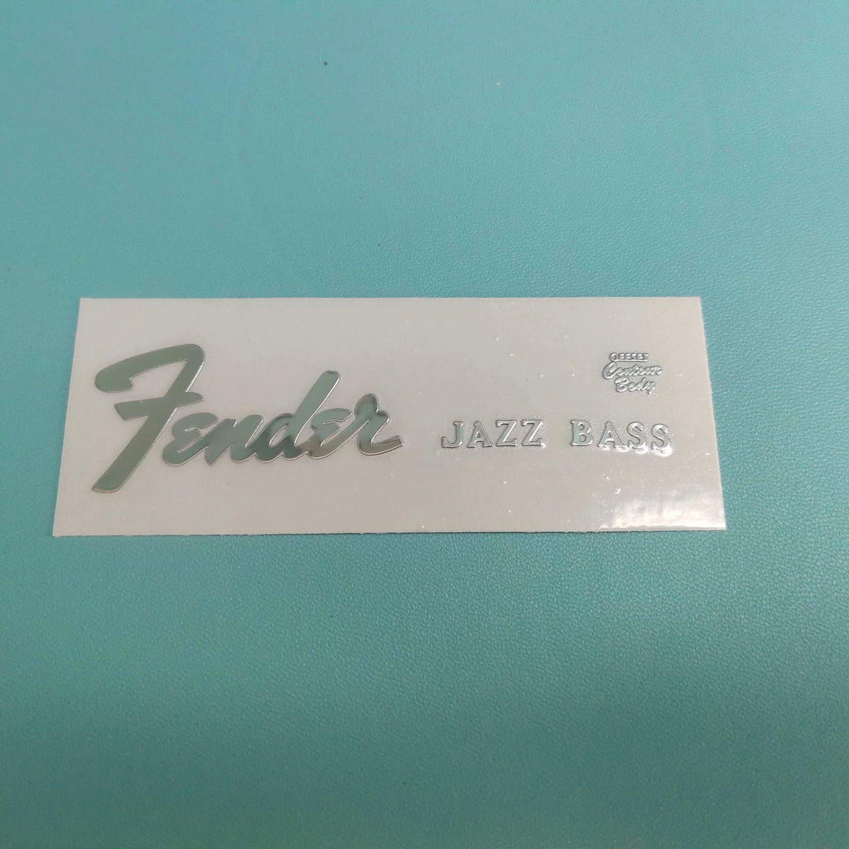 Guitar Head Silver Logo Metal Label UV Adhesive Tear off Film Leave Words - Fender Jazz Bass