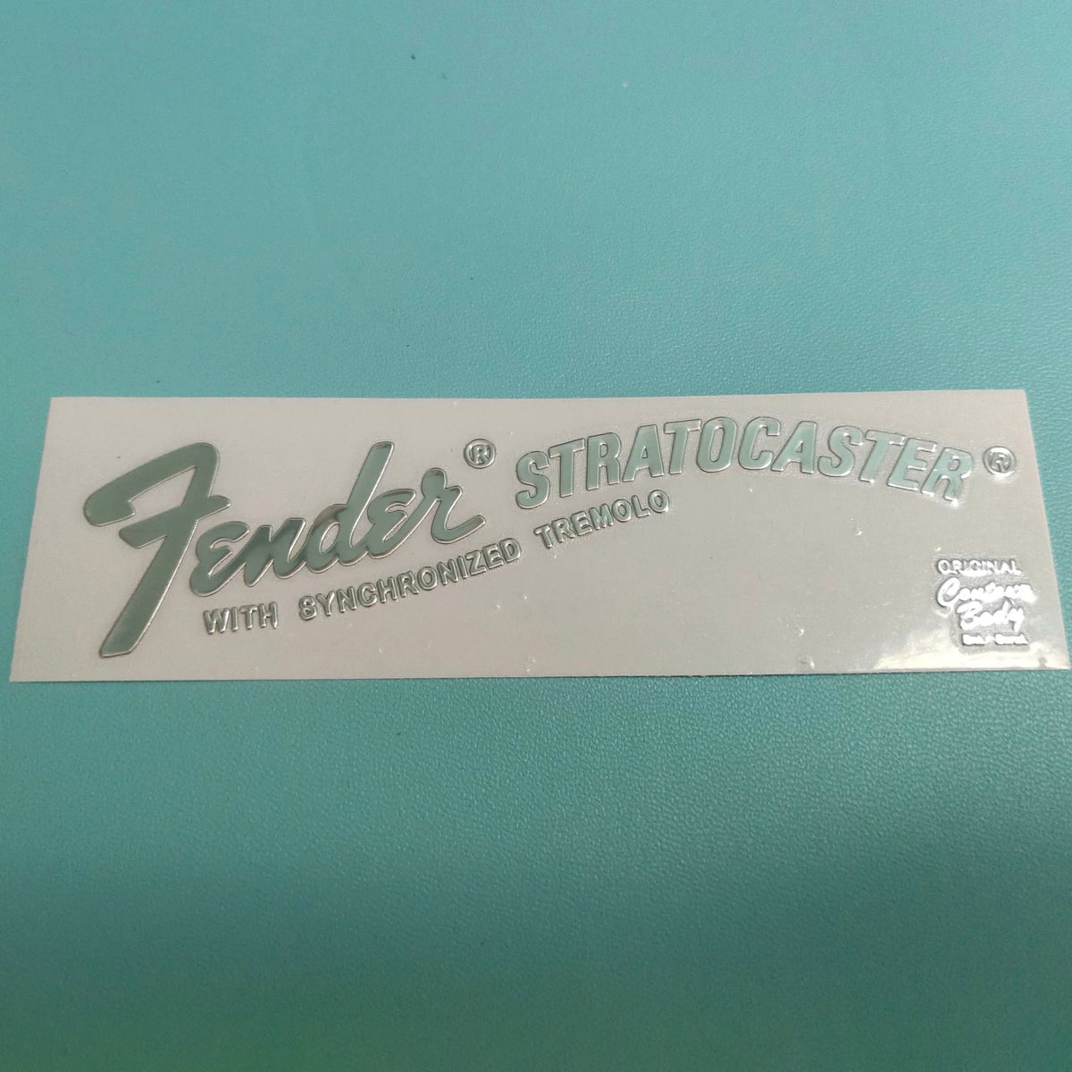 Guitar Head Silver Logo Metal Label UV Adhesive Tear off Film Leave Words - Fender ST 70S