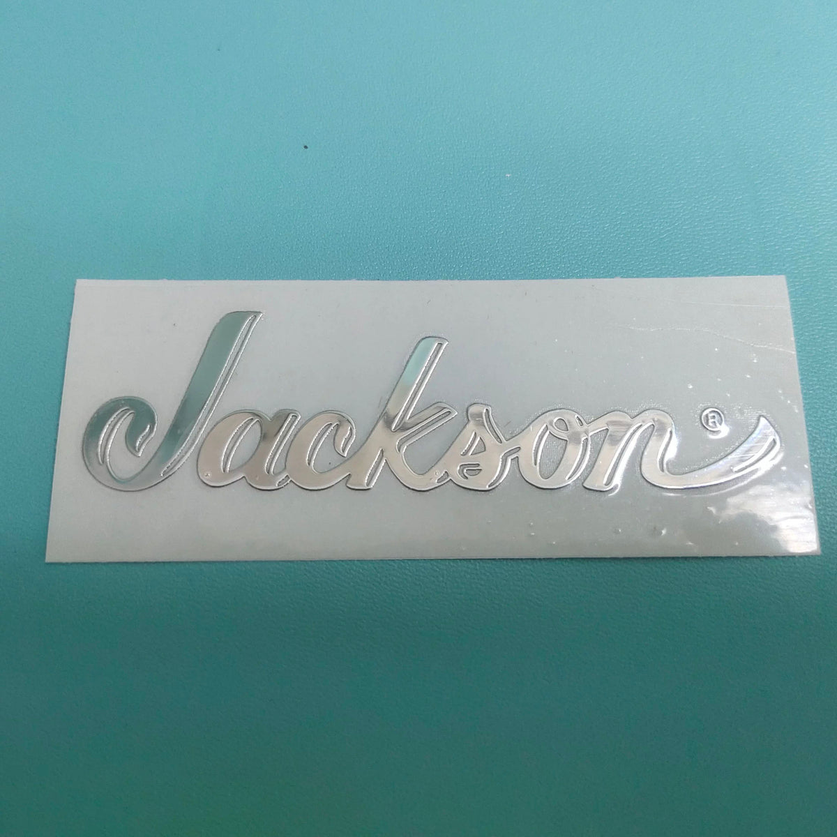 Guitar Head Silver Logo Metal Label UV Adhesive Tear off Film Leave Words - Jackson