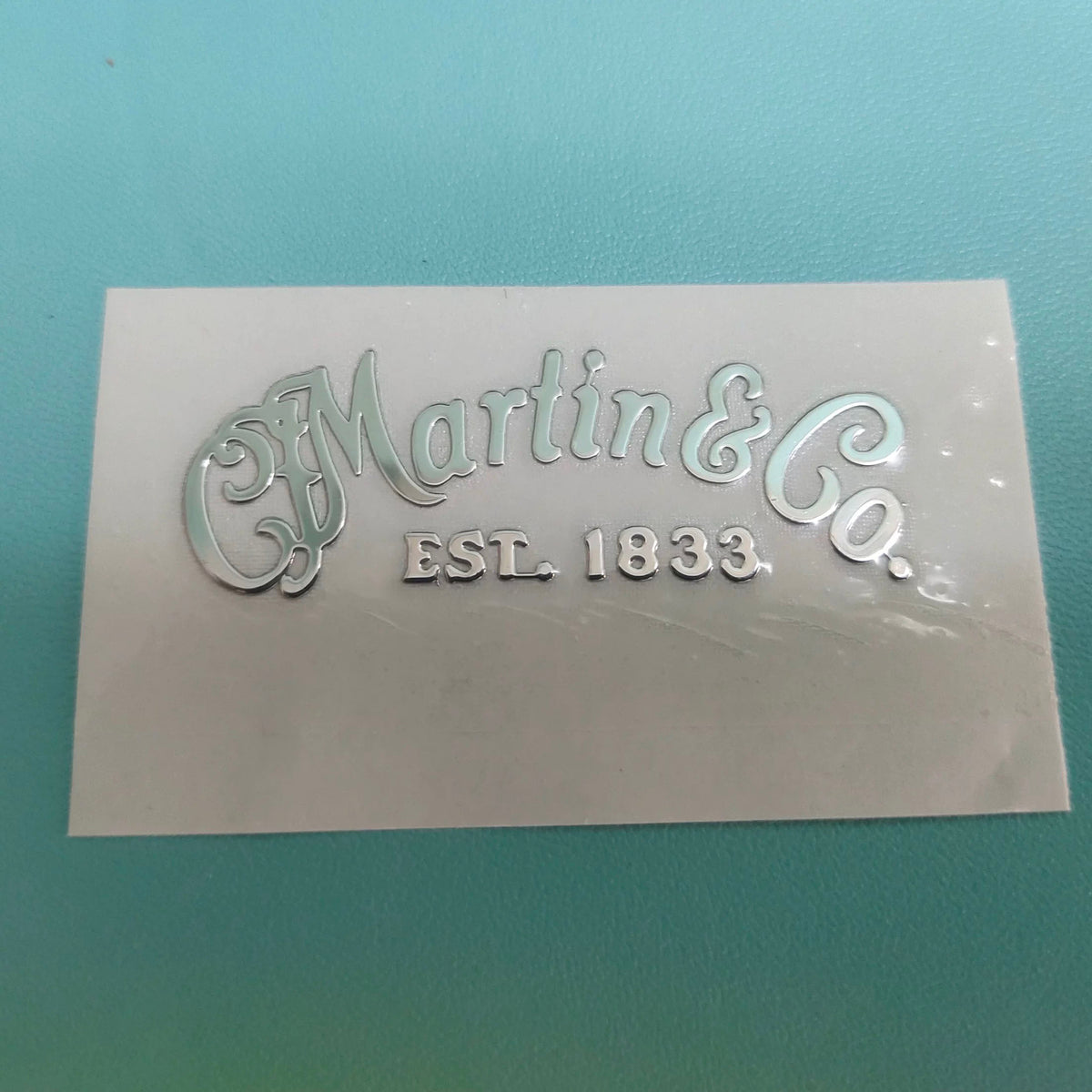 Guitar Head Silver Logo Metal Label UV Adhesive Tear off Film Leave Words - Martin